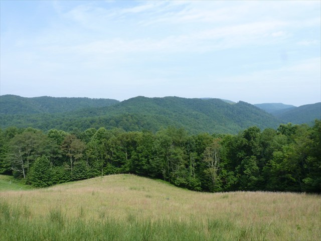 Looking West across to Limestone Mountain.  Ride comes back across the mountain from right to left.